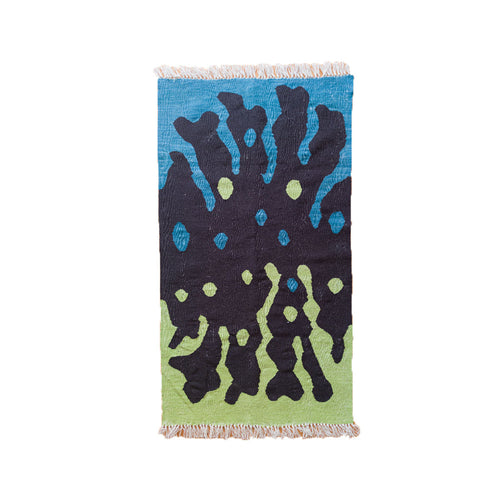 Abstract kilim rug with blue, black, and green patterns, fringed edges, wall decor